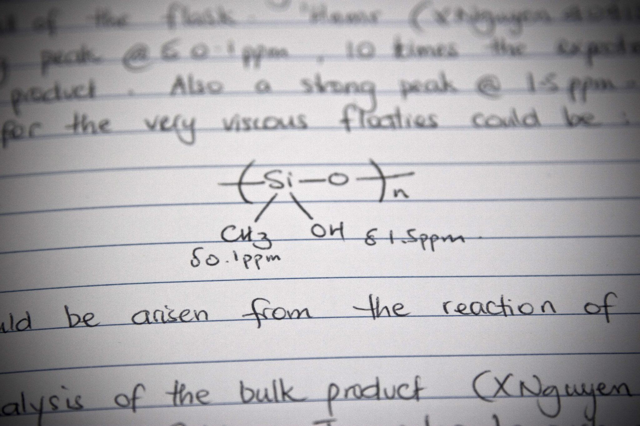 Handwritten entry in a science lab notebook