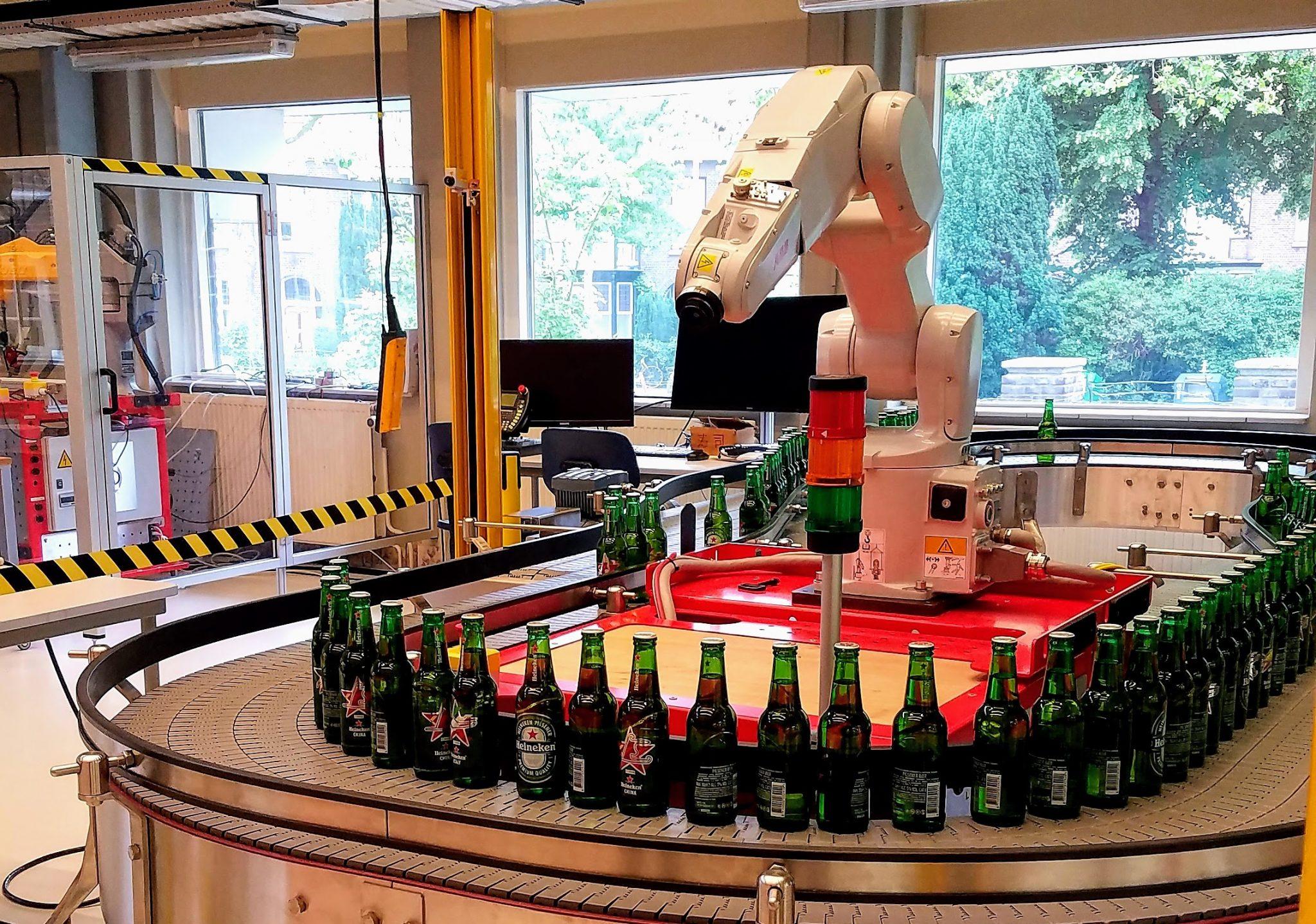 Heineken robot that helps pick up fallen bottles