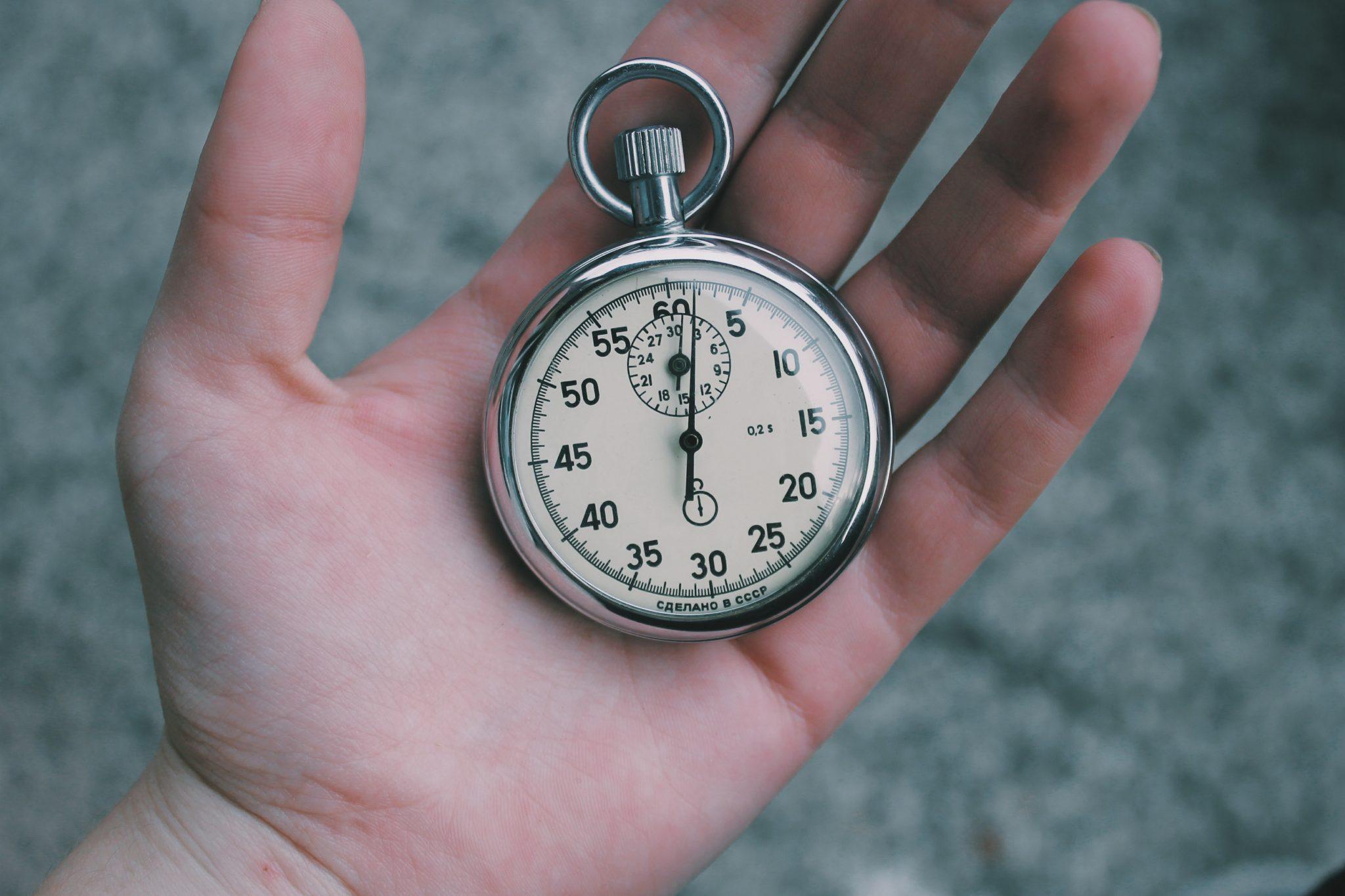Hand with stopwatch