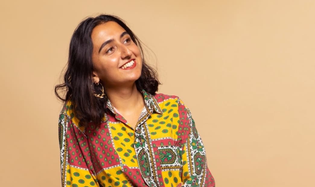 Photo of Anisah Osman Britton, CTO of Vinokilo, in a vintage shirt looking fly