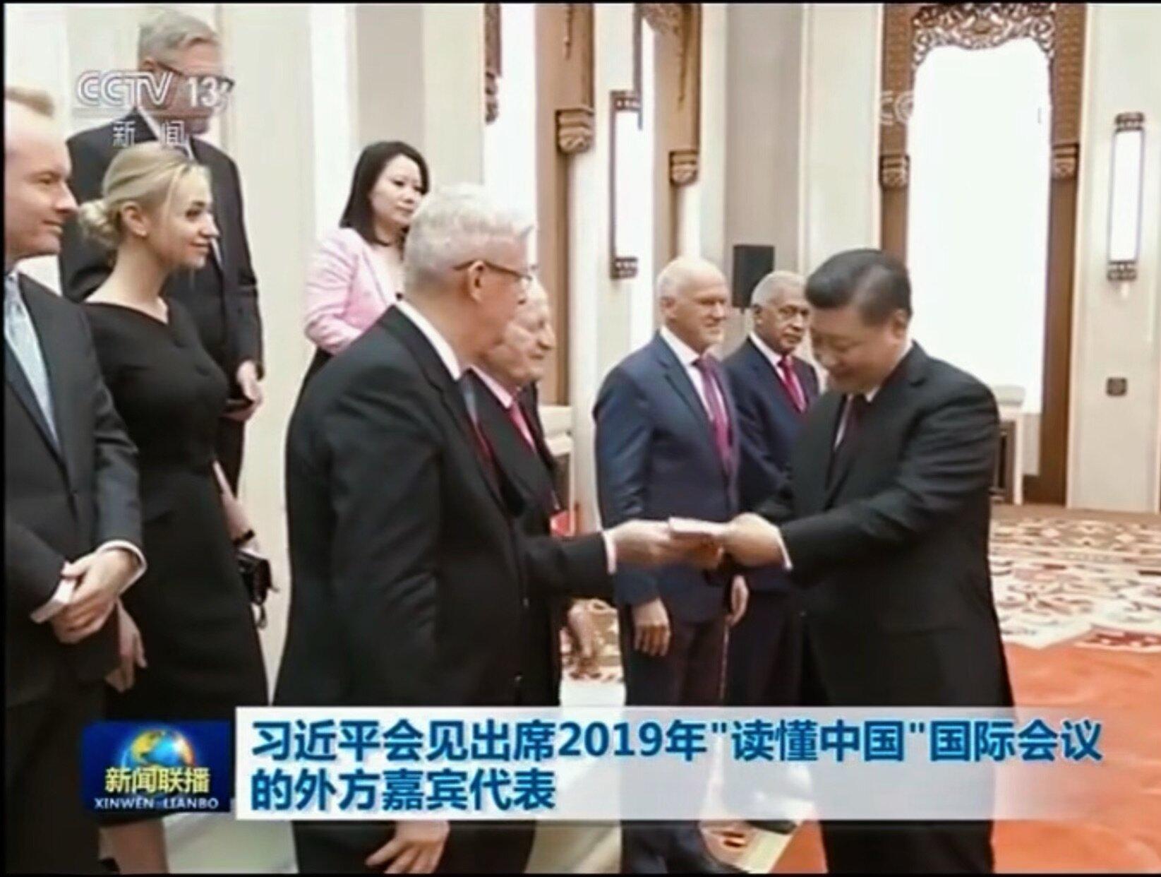 Angelica Anton waits in line to meet Xi Jinping. Photo taken from Silk's website.