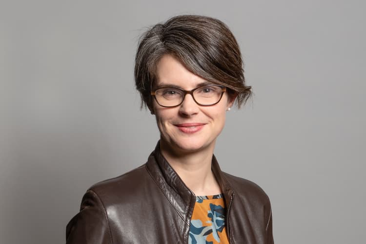 A headshot portrait of Chloe Smith
