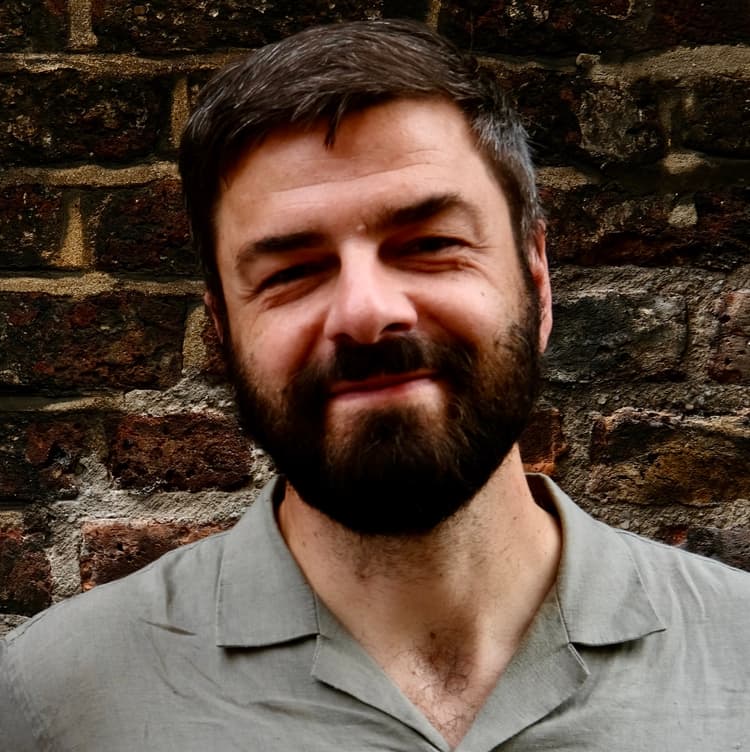 Headshot of Mathias Meyer, former founder turned executive leadership coach and author.
