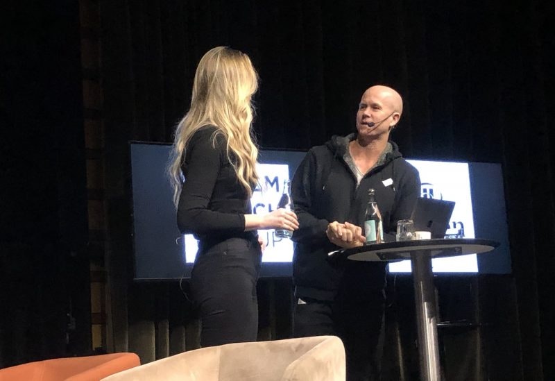 Image of Tuva Palm and Tyler Crowley on stage during one of their monthly tech meet-ups in Stockholm