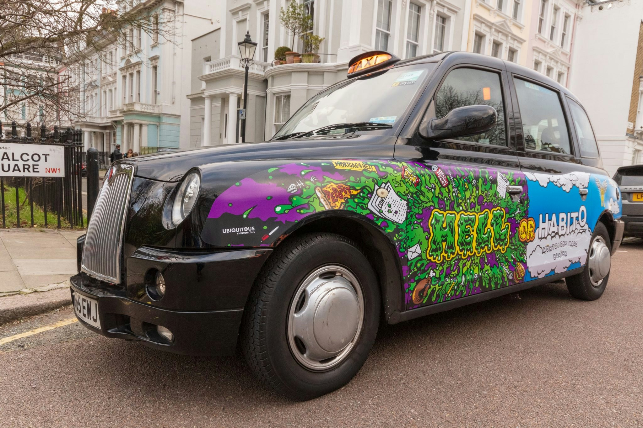 A Habito advert on a black cab in London.
