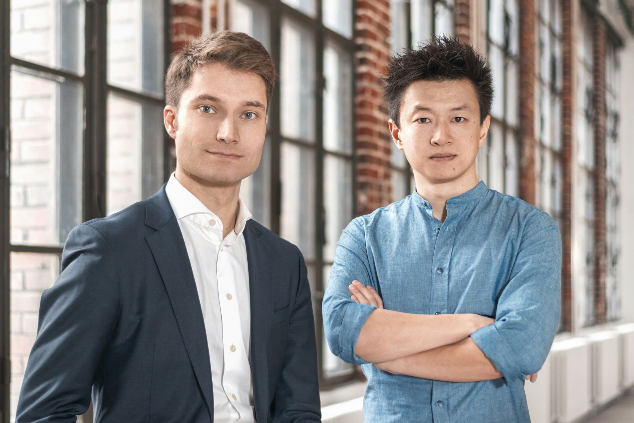 Photo of Johannes Reck (left) and Tao Tao, two of the four founders of GetYourGuide.