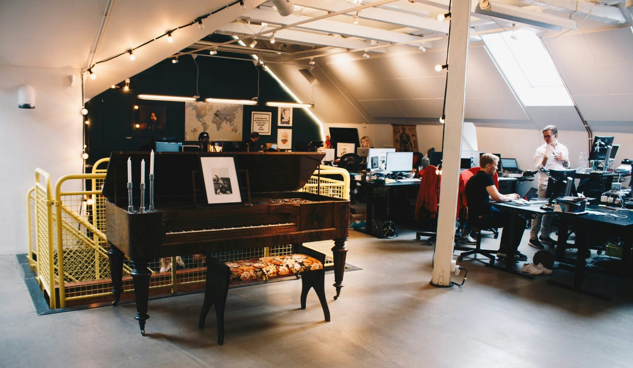 Image of a piano from the Epidemic Sound Stockholm office 