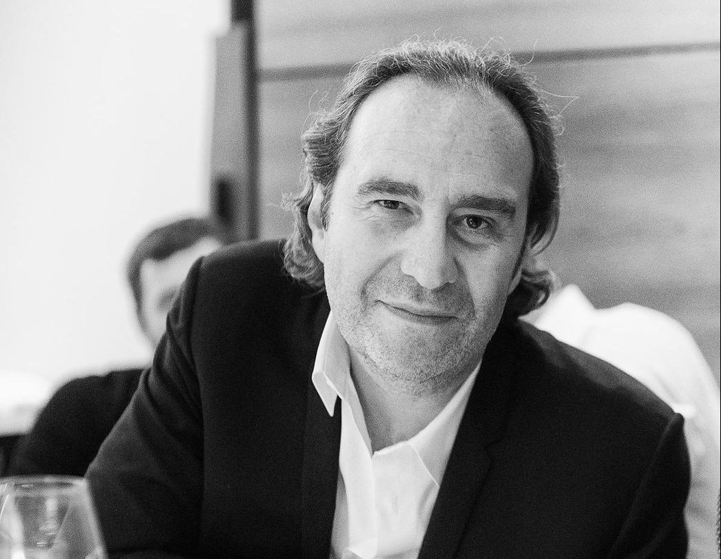 A black and white image of French billionaire Xavier Niel