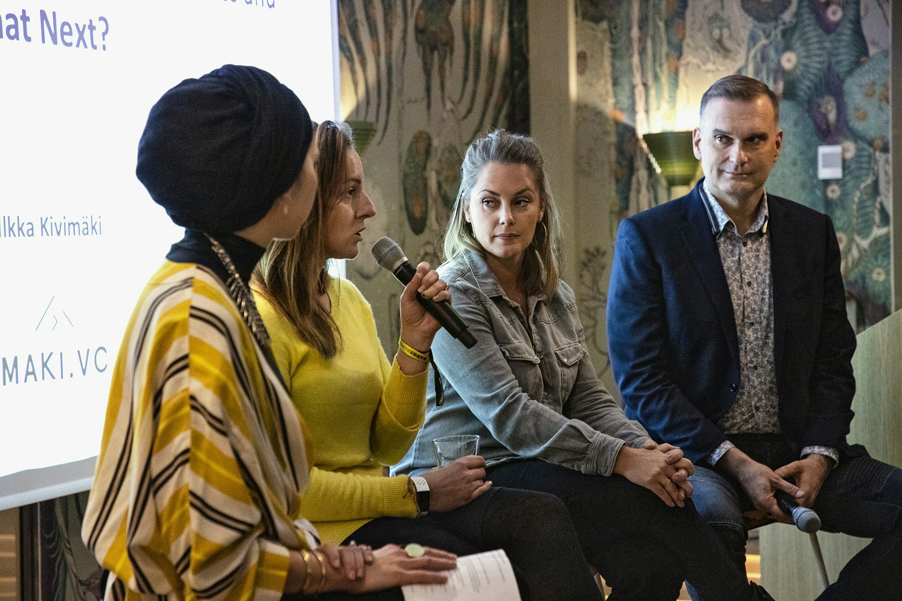 Photo of Marta Sjögren (centre left) and Sophia Bendz (centre right) speaking at the Inklusiiv launch event.