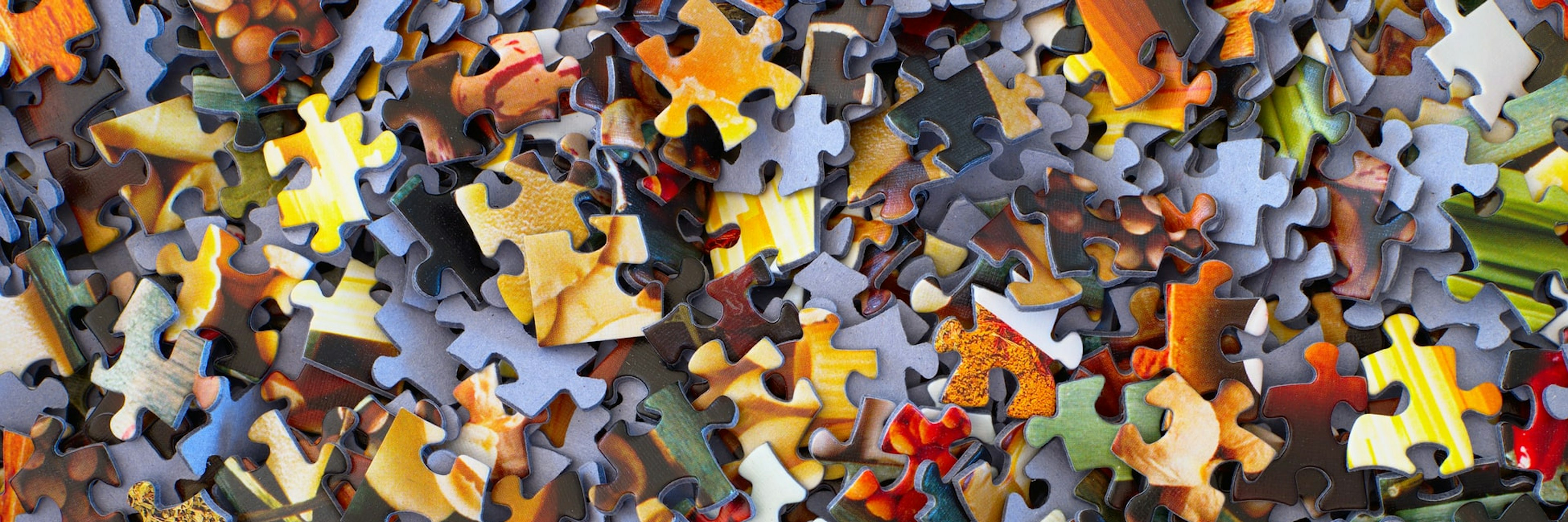 photo of jigsaw puzzle pieces