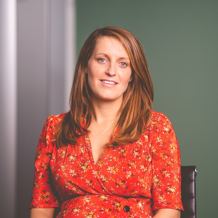 A headshot of Rebecca Hunt