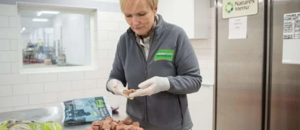 Woman preparing a Nature's Menu meal