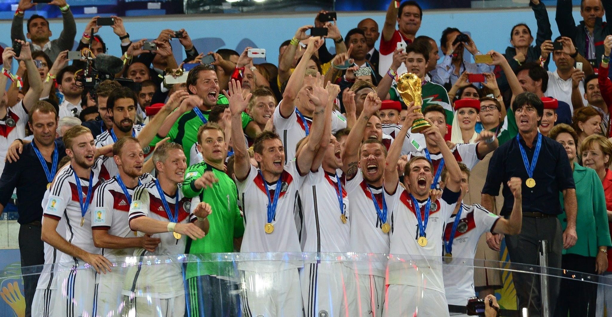 German captain, Philipp Lahm lifts the 2014 FIFA World Cup after beating Argentina