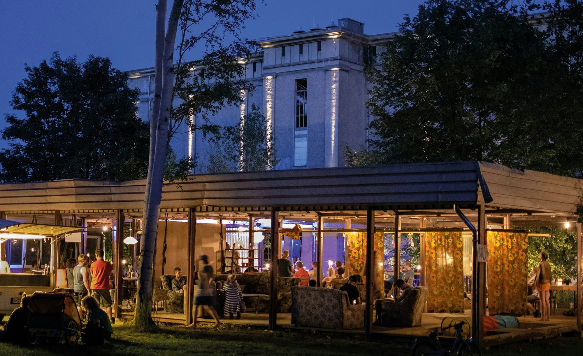 The outdoor terrace at the Kühlhaus on a warm summer evening.