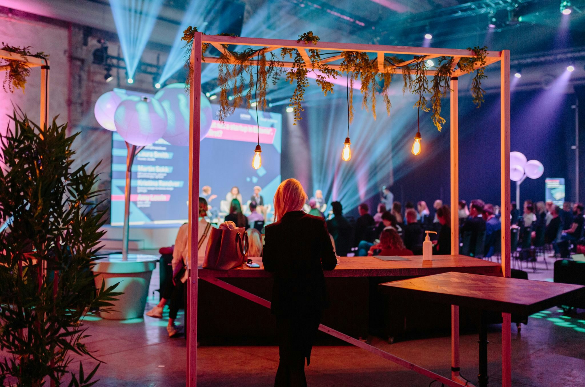 A waiter behind the bar during a talk at Sifted Sessions Tallinn