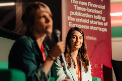 Amy Lewin and Eleanor Warnock on stage at a past Sifted event