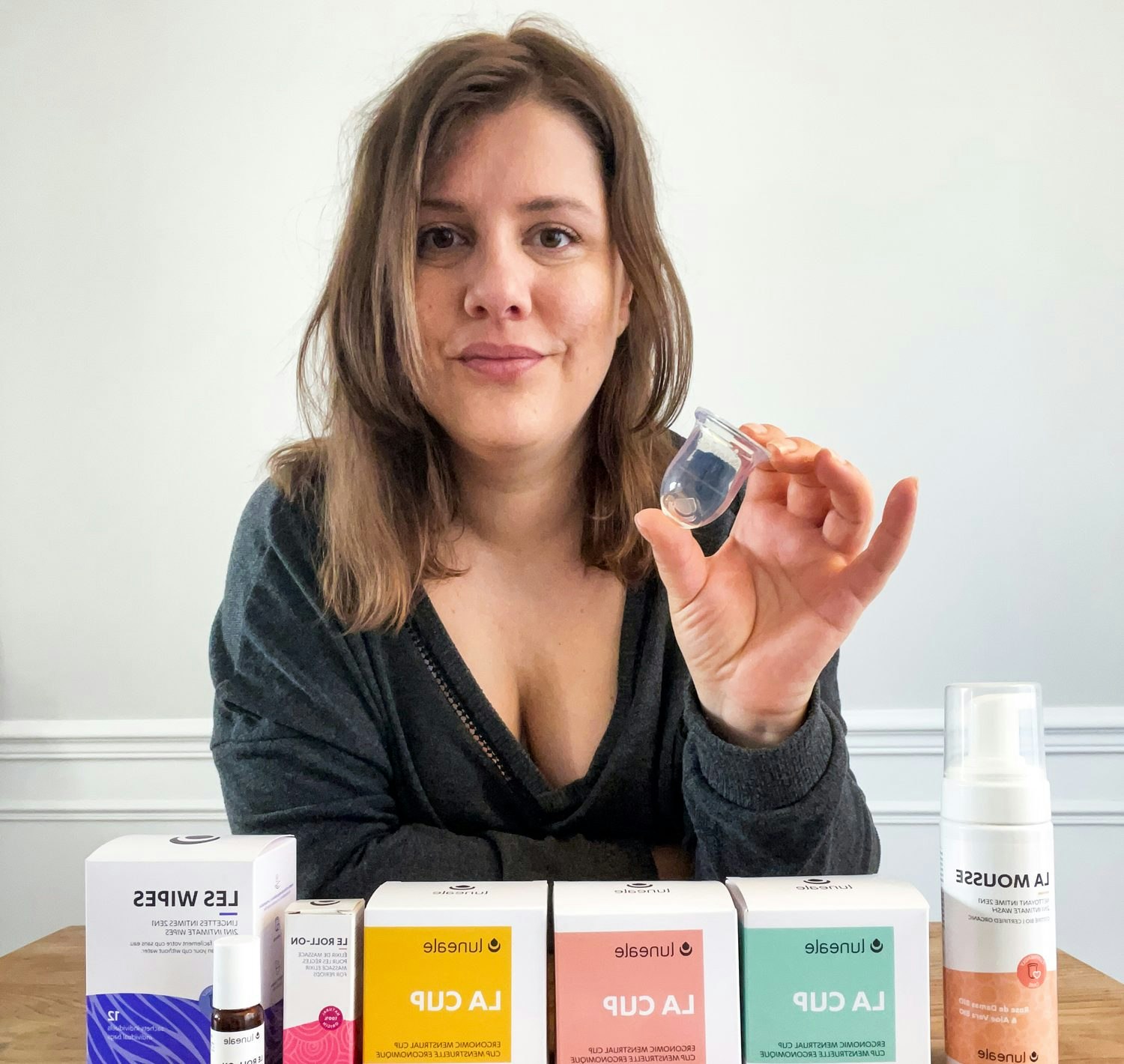 Leocadie Raymond, the founder of Luneale, with her products