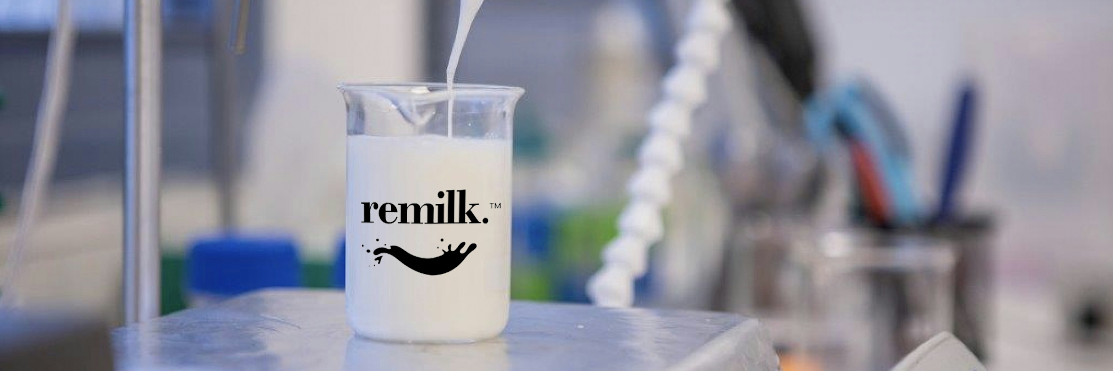 An image of a beaker filled with Remilk's alt-dairy milk