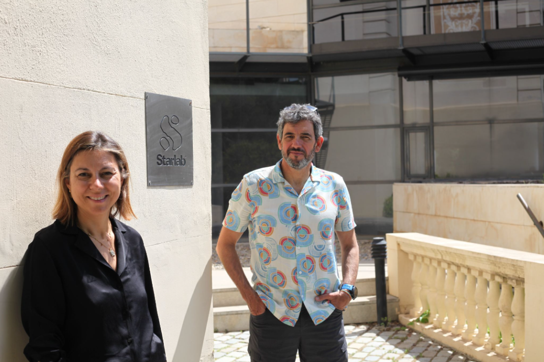 An image of Ana Maiques and Giulio Rufini standing outside Starlab’s Barcelona HQ