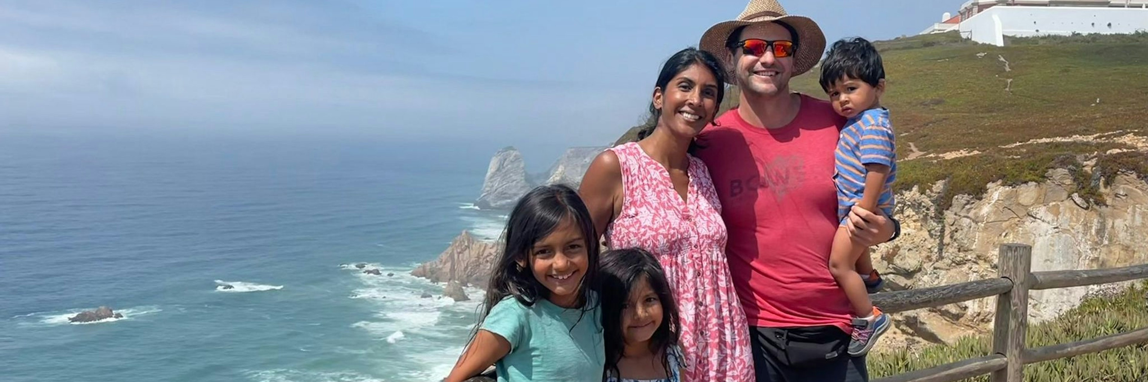 An image of entrepreneur Nick Taranto and his wife Nimmi Roche, a digital nomad family who recently took their children on a workation in Portugal