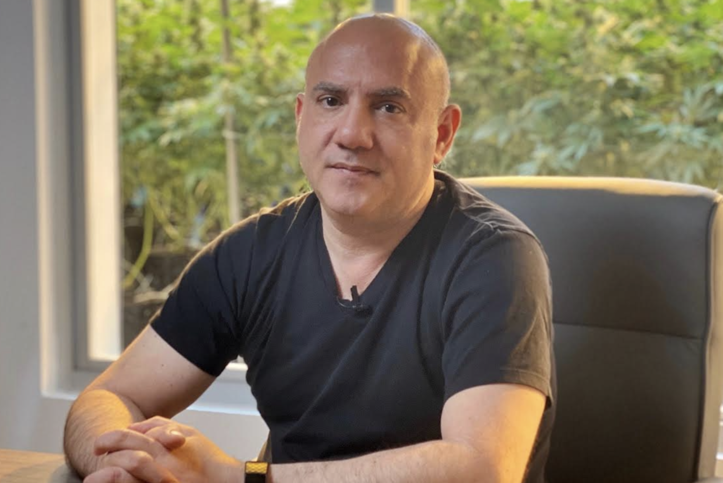 Michael Sassano at his desk