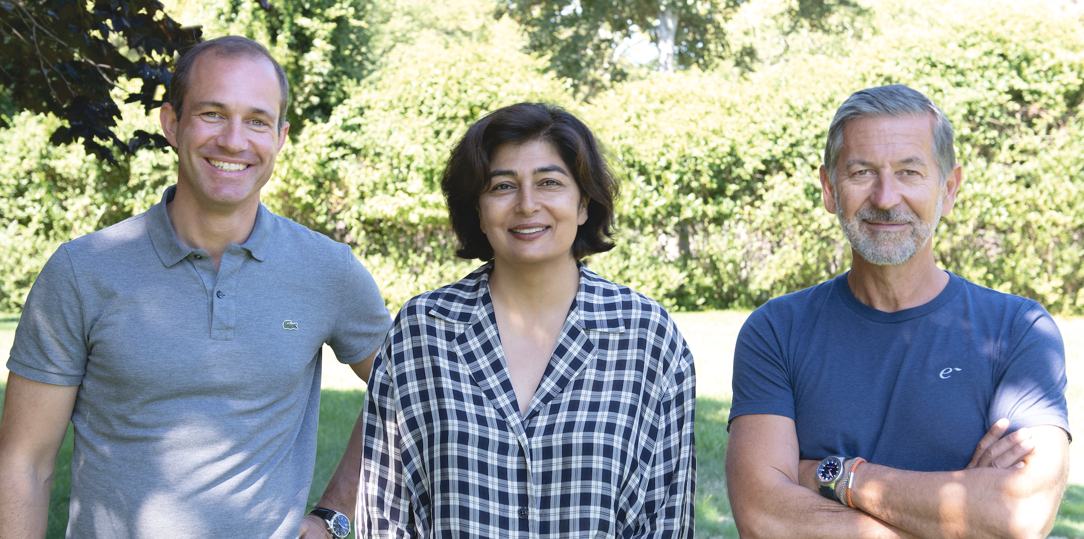 A landscape photo of three Energy Impact Partners partners (M. Dill, N. Moosa. H. Kobler)