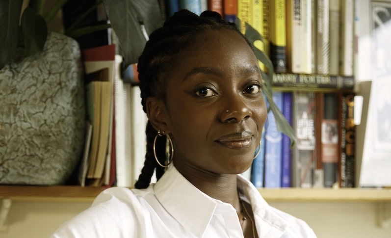 A close up headshot of Joycelyn Longdon, a PhD student at the University of Cambridge working on the application of artificial intelligence for climate change