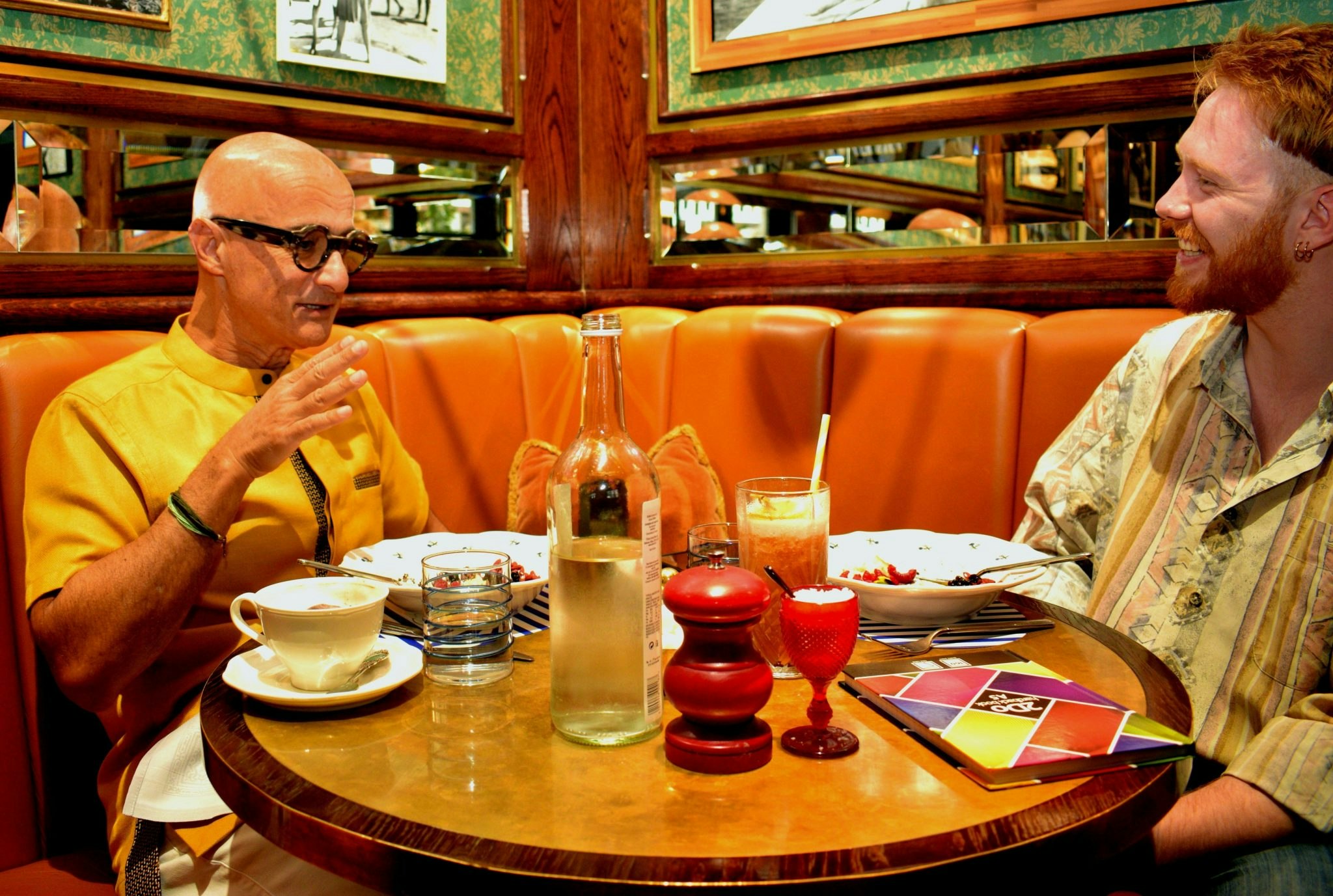 A photo of Babylon CEO Ali Parsa speaking to Sifted reporter Kai Nicol-Schwarz over brunch at Harry's Dolce Vita in Knightsbridge