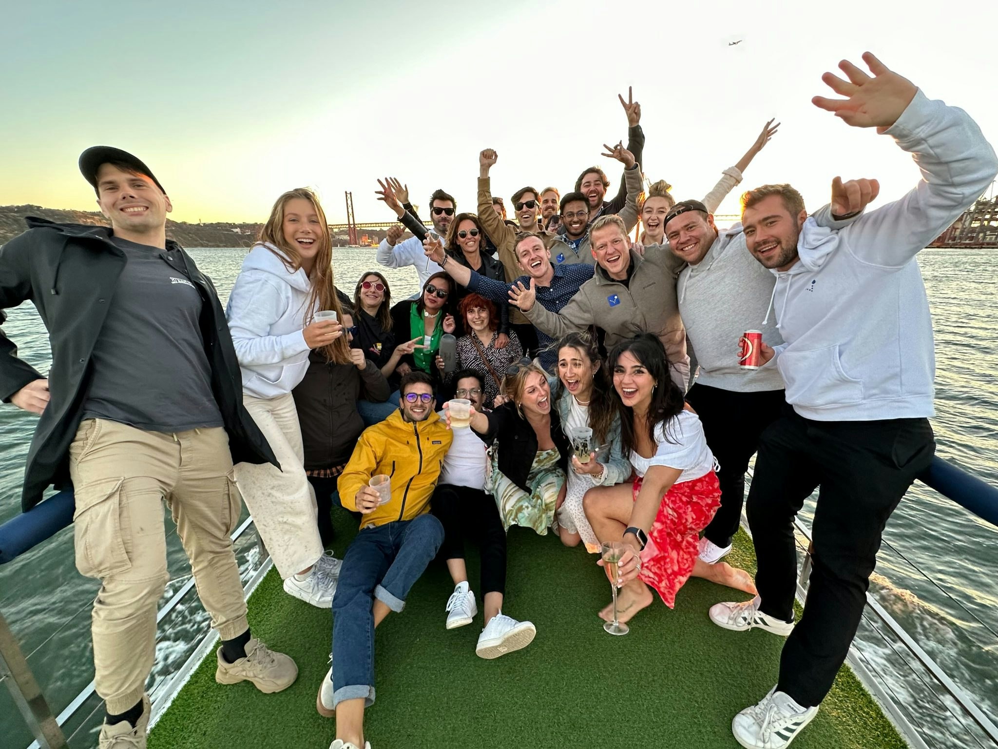 A fisheye image of the Bounce team on a boat ride in Lisbon