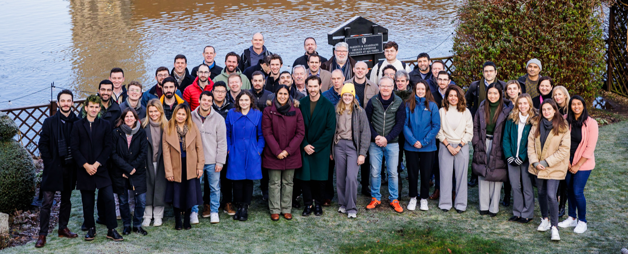 The Ori Biotech team stood in front of a body of water