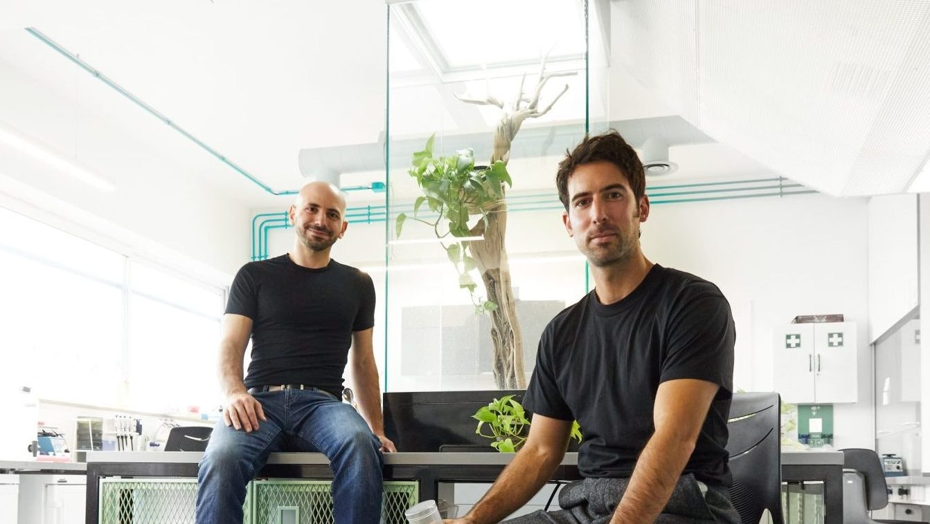 Two men sitting in an office