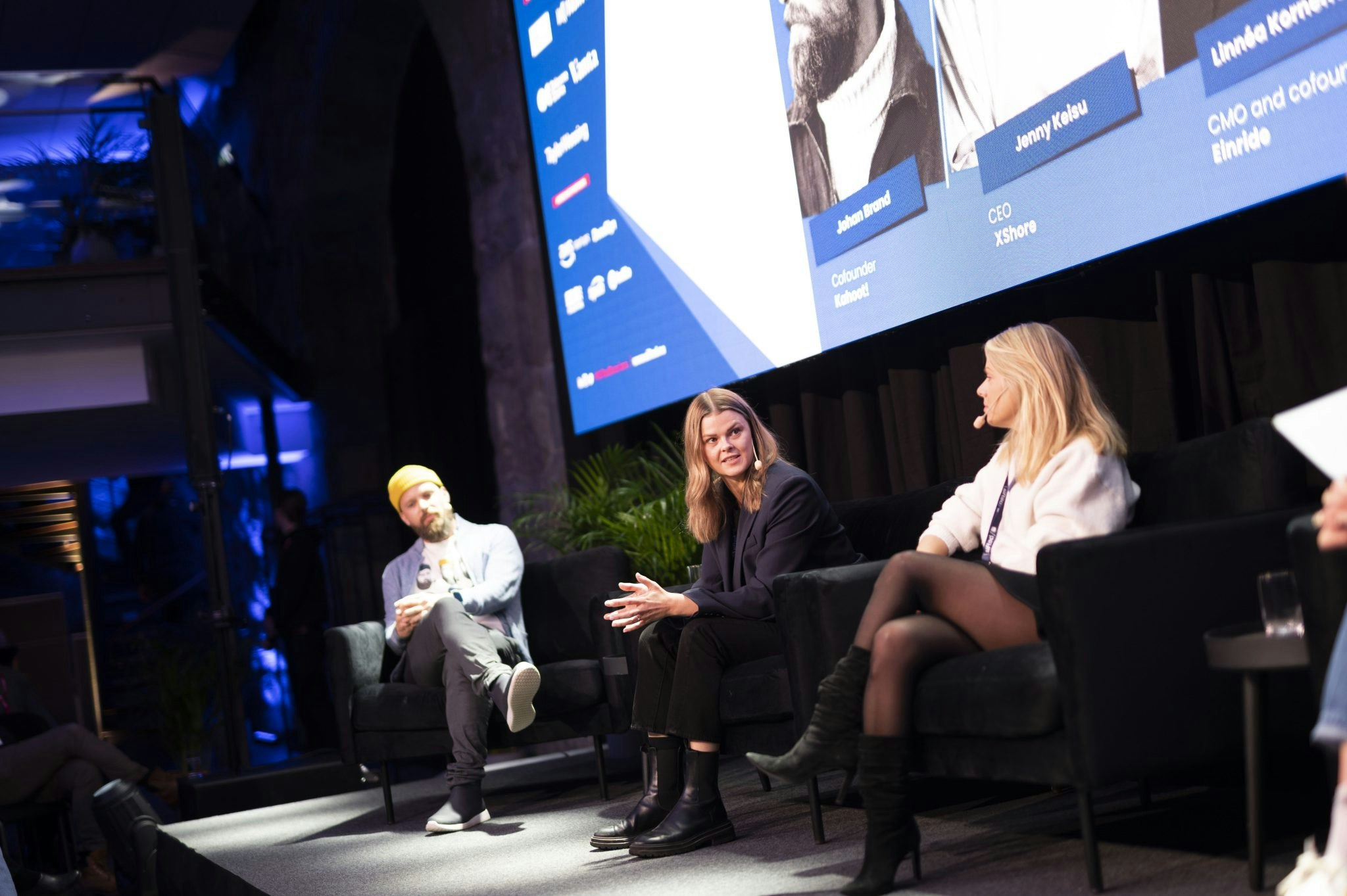 A photo of Johan Brand, cofounder, Kahoot!, Linnéa Kornehed Falck, CMO and cofounder, Einride and Jenny Keisu, CEO, XShore sitting on stage at a panel at Sifted Sessions / Stockholm