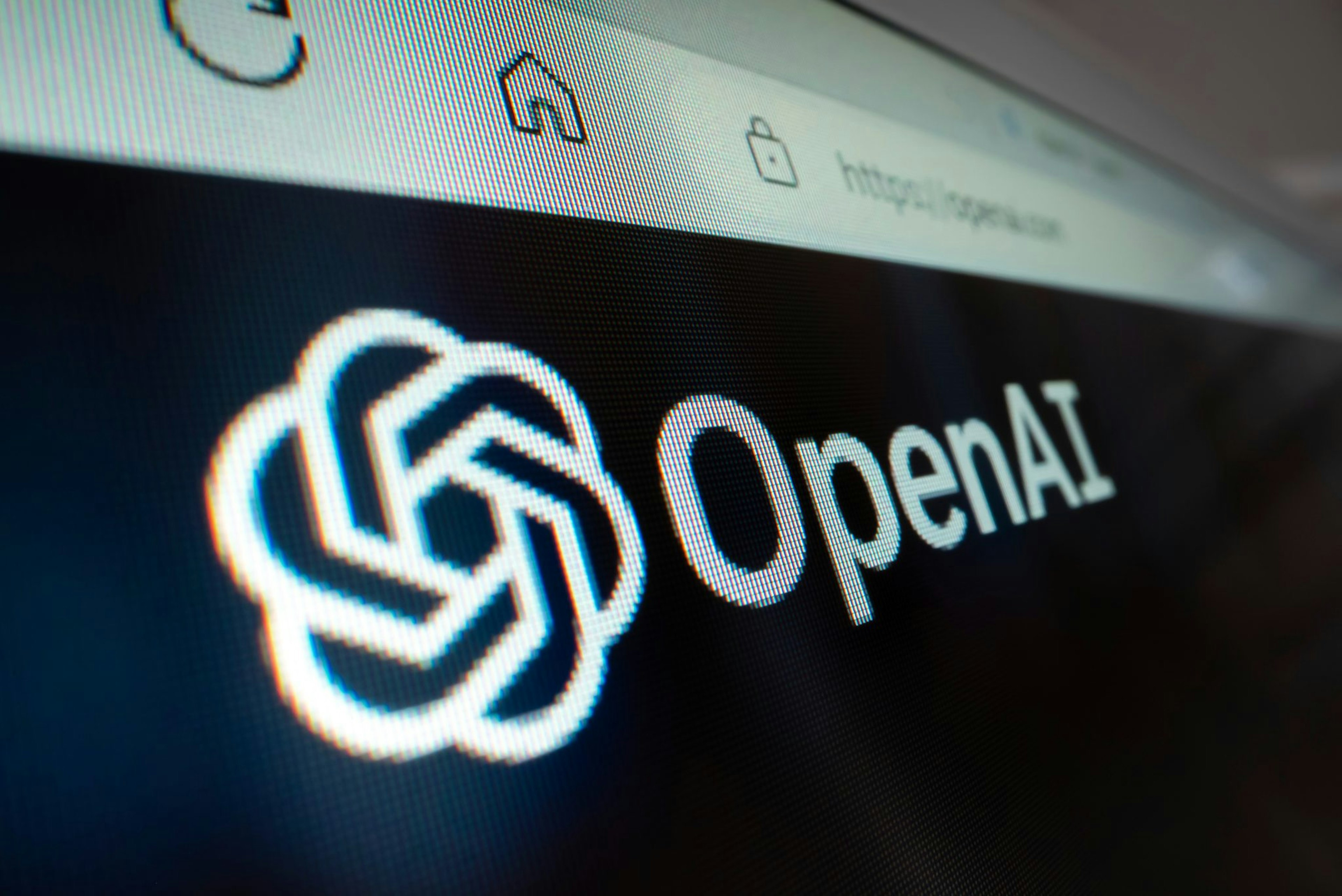 Image of the openAI logo on a computer monitor