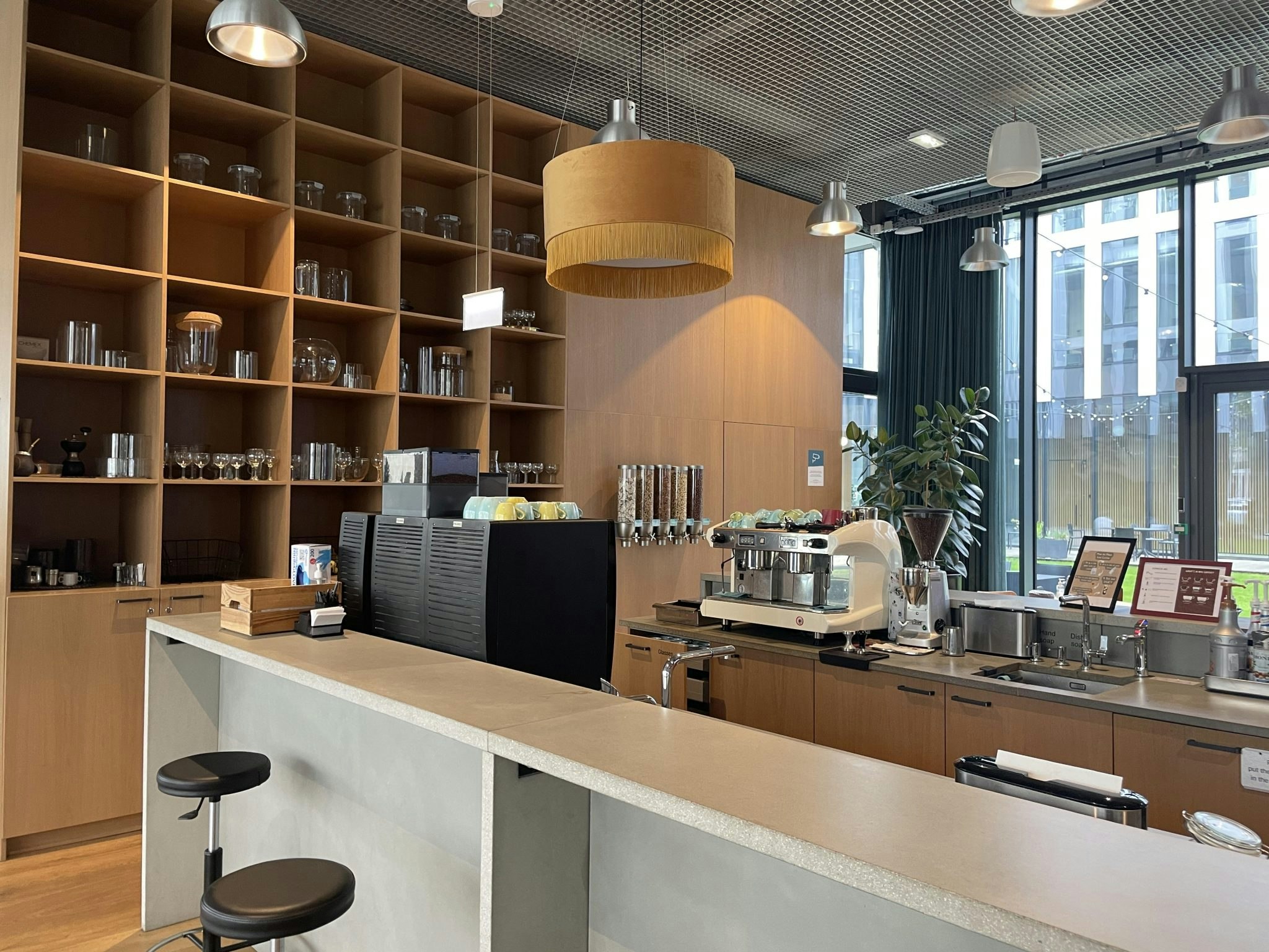 A photo of the coffee counter at Vinted's office, mostly in a light wood