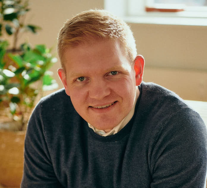 Headshot of Michael Karlsen, CEO and cofounder of Onomondo