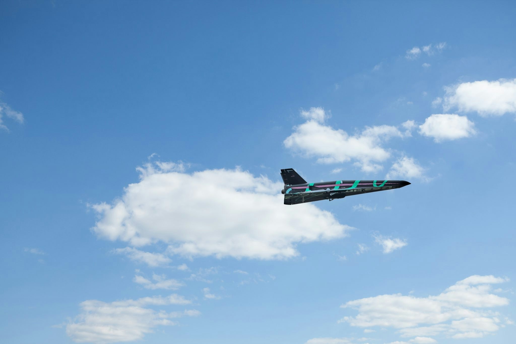 A photograph of Destinus's scaled-down model plane in flight
