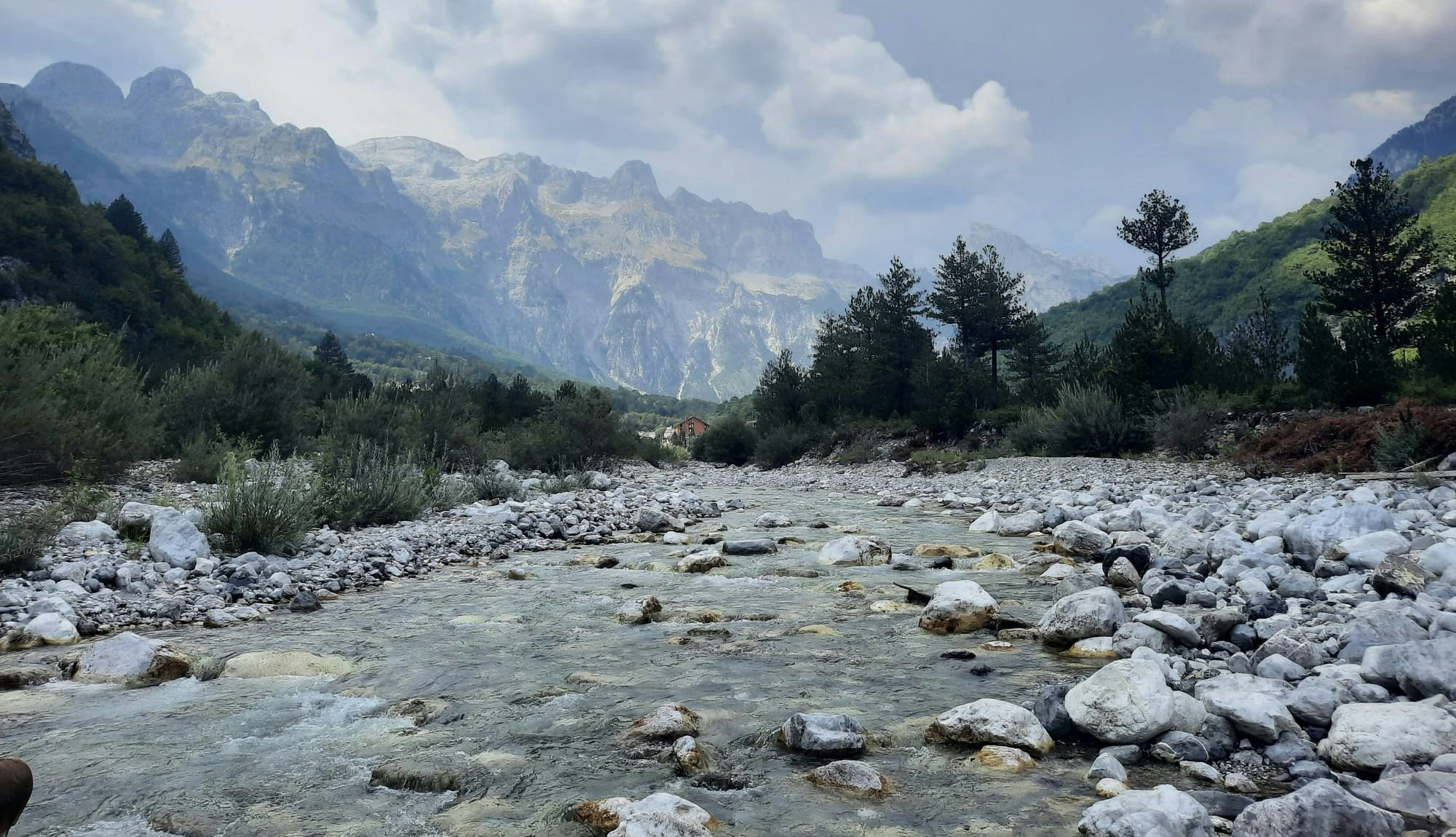 Ice cold water and mountains in Theth, a mountain range north of Tirana