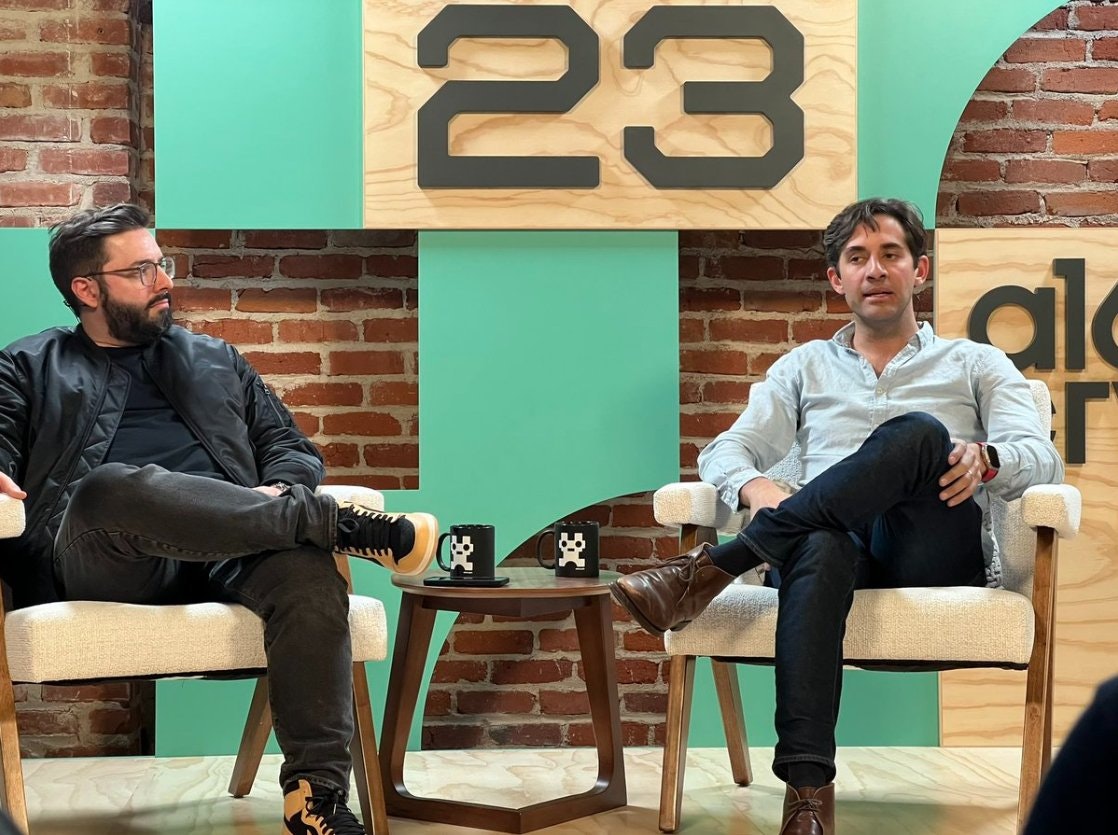 A16z CTO Eddy Lazzarin and Farcaster cofounder Dan Romero speaking at last year's accelerator.