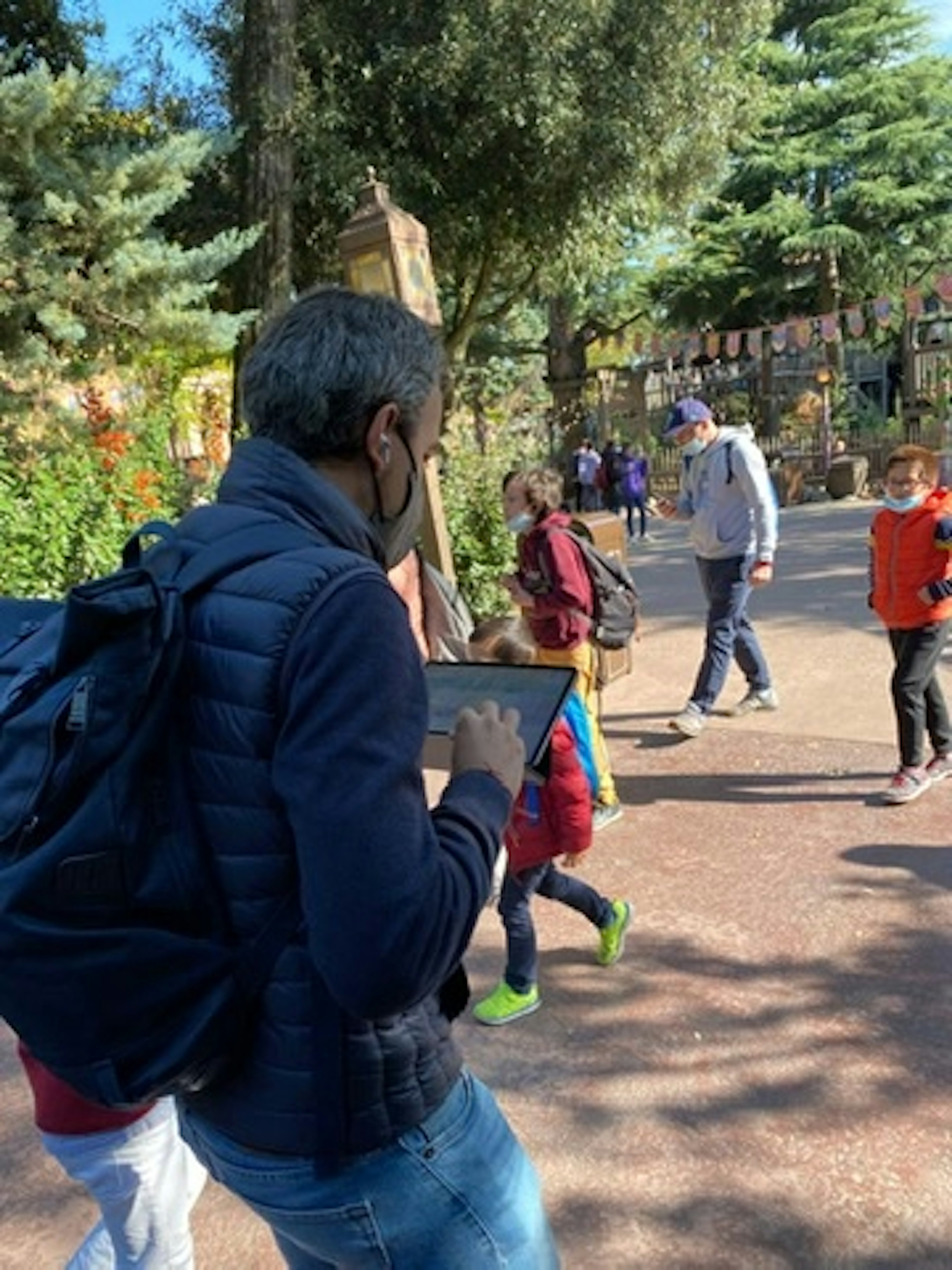 Jorge in Disneyland, working on his iPad