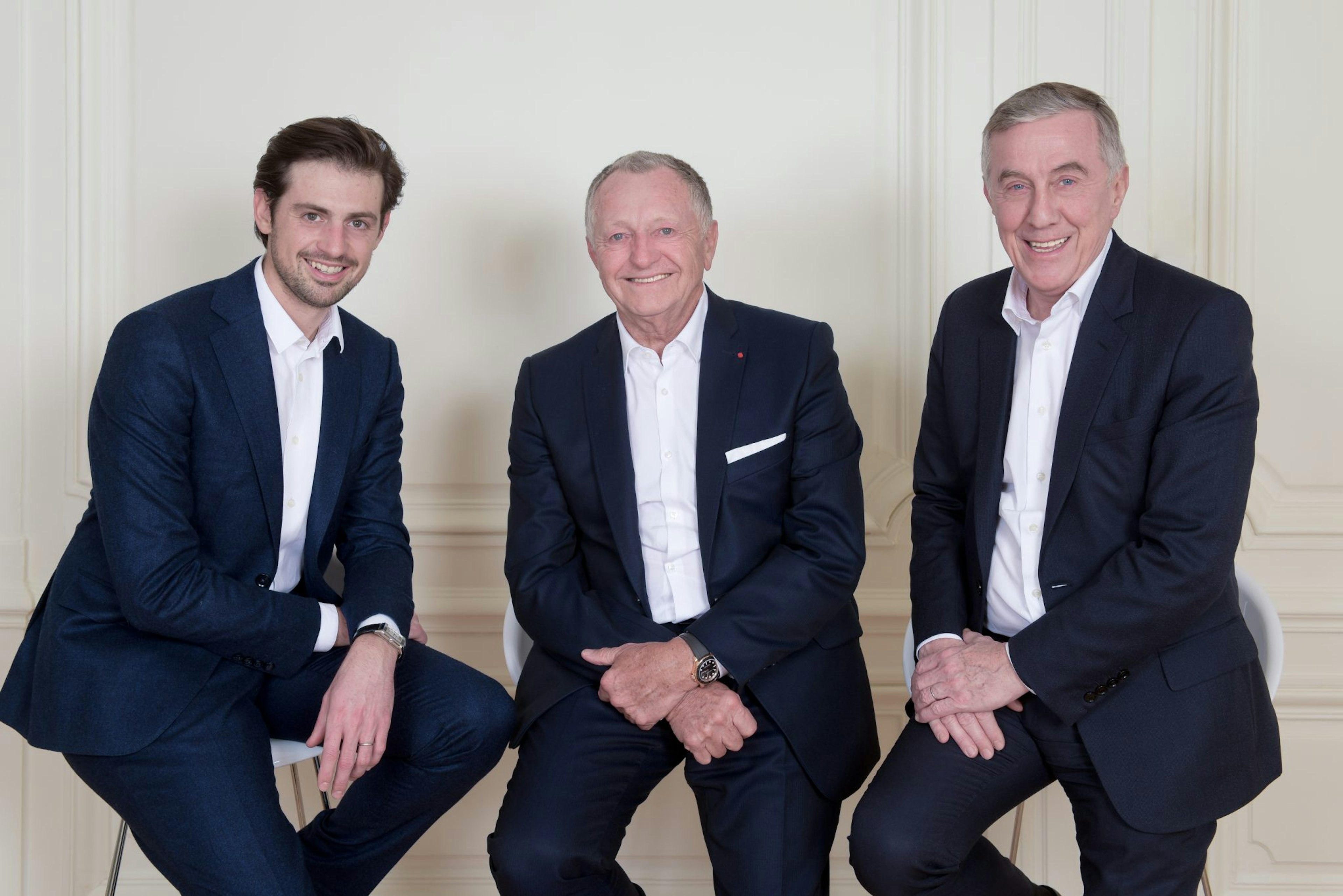 A picture of Holnest's Jean-Michel Aulas, Alexandre Aulas and general manager Patrick Bertrand