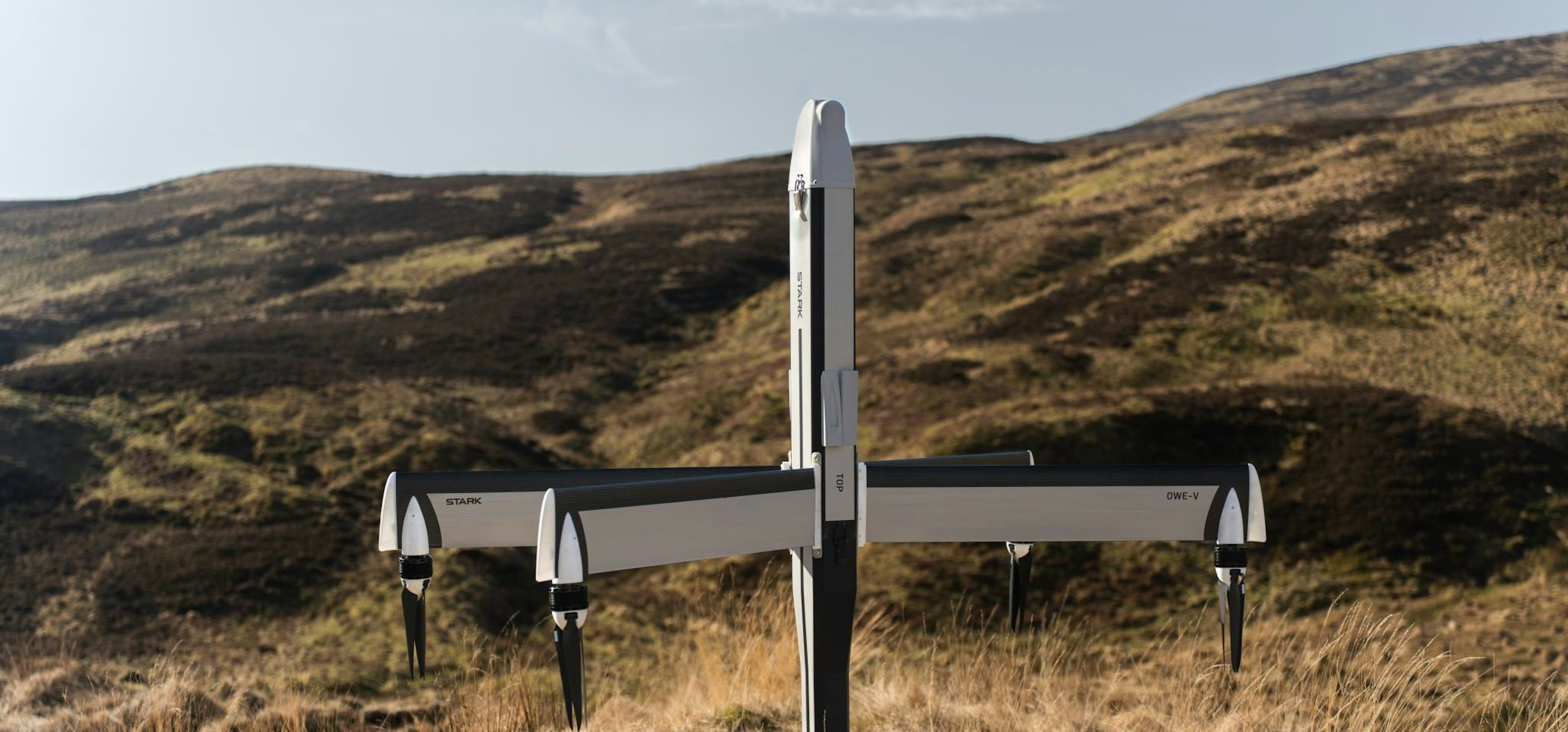 Stark drone in a field