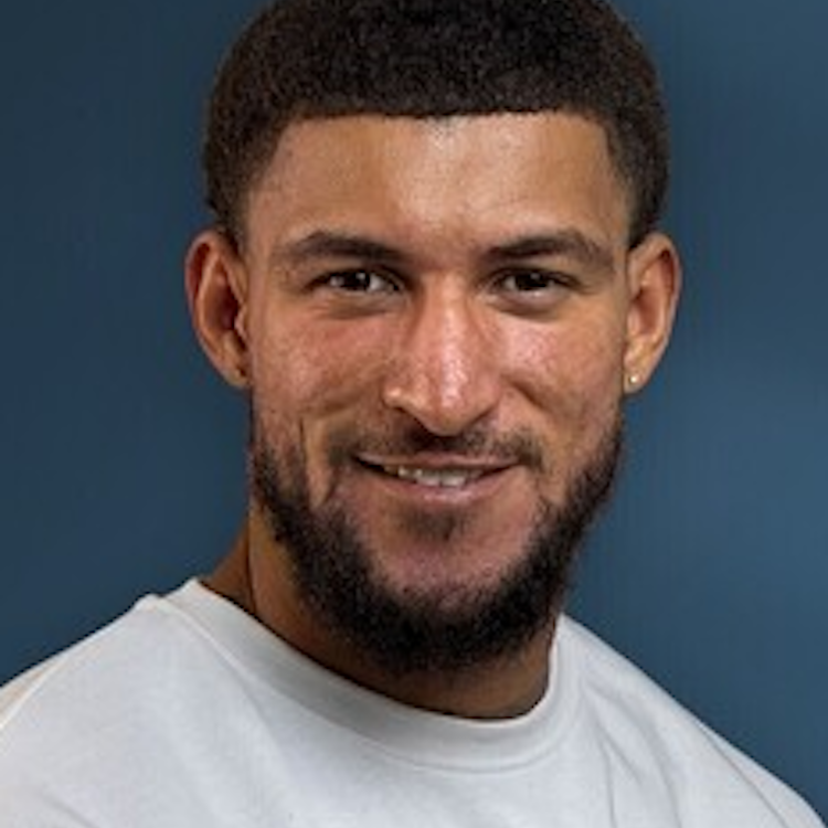 A picture of Reece Batchelor, talent lead at Photoroom