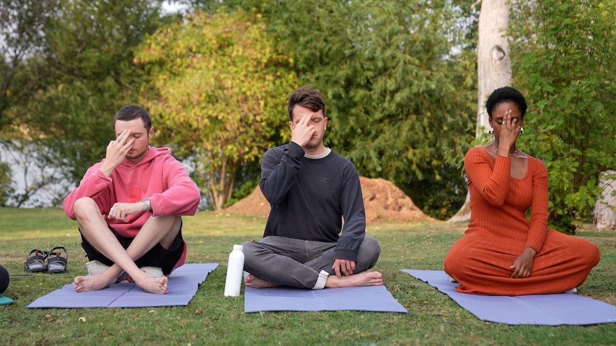 Founders doing yoga on a longevity retreat