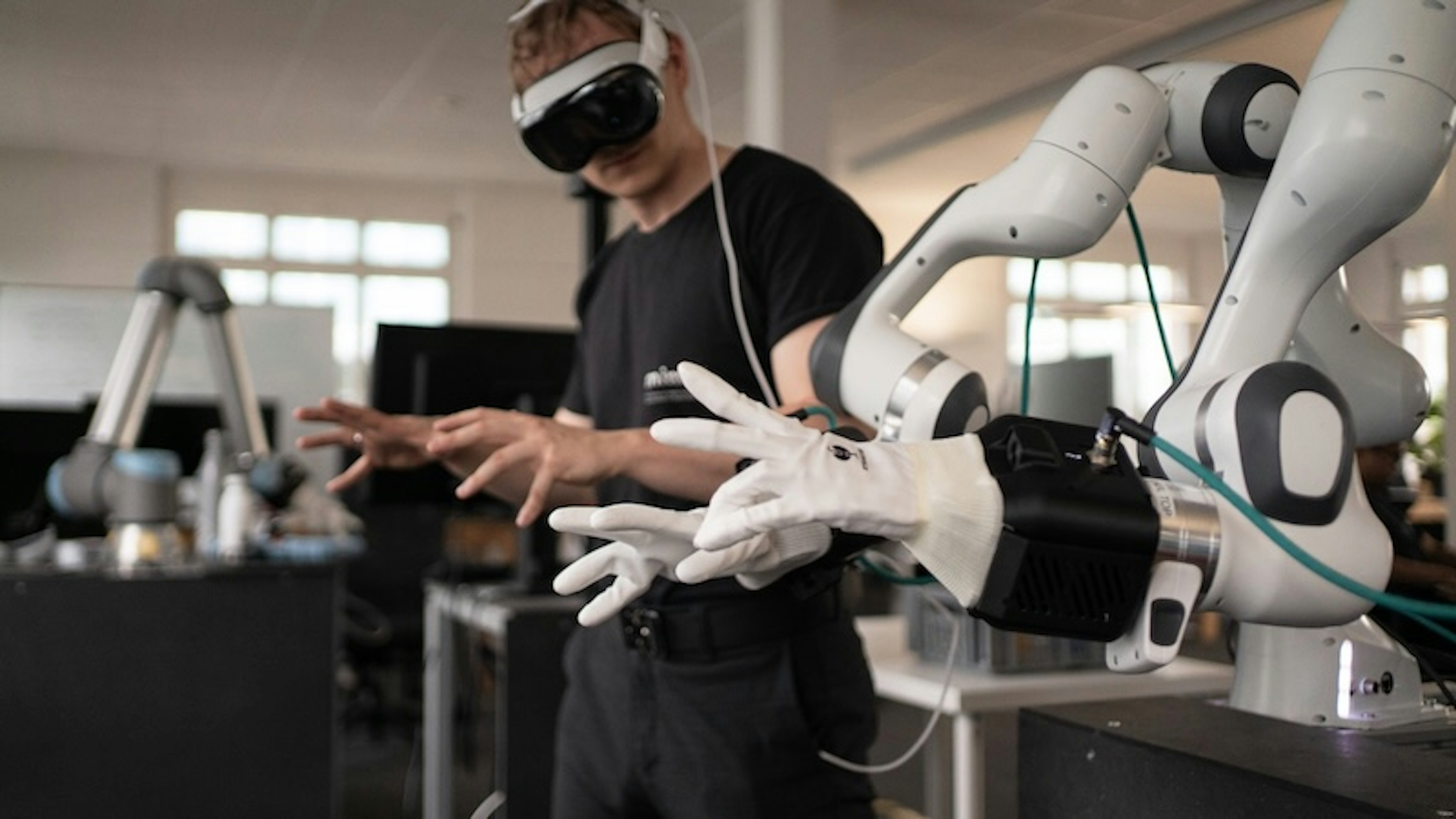 Mimic's robotic hands learning from human action. 