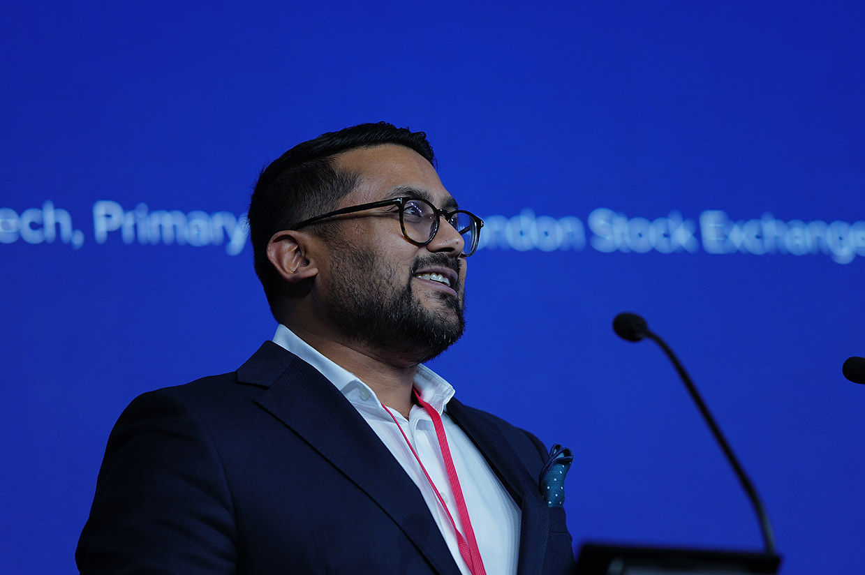 A photo of Neil Shah at the London Stock Exchange