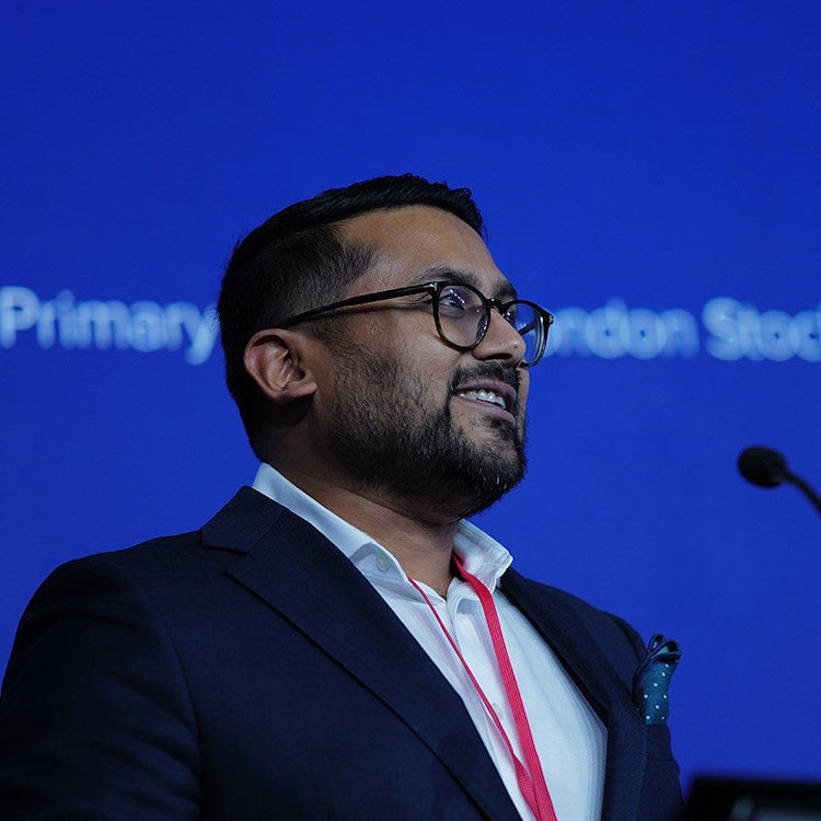 A photo of Neil Shah at the London Stock Exchange