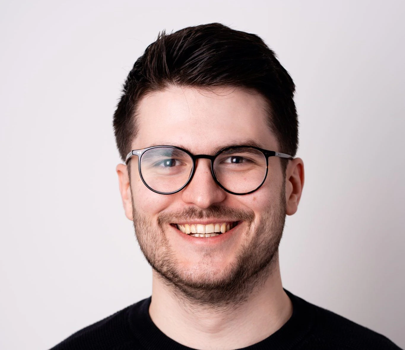 A picture of Christian Neumann, principal at First Momentum