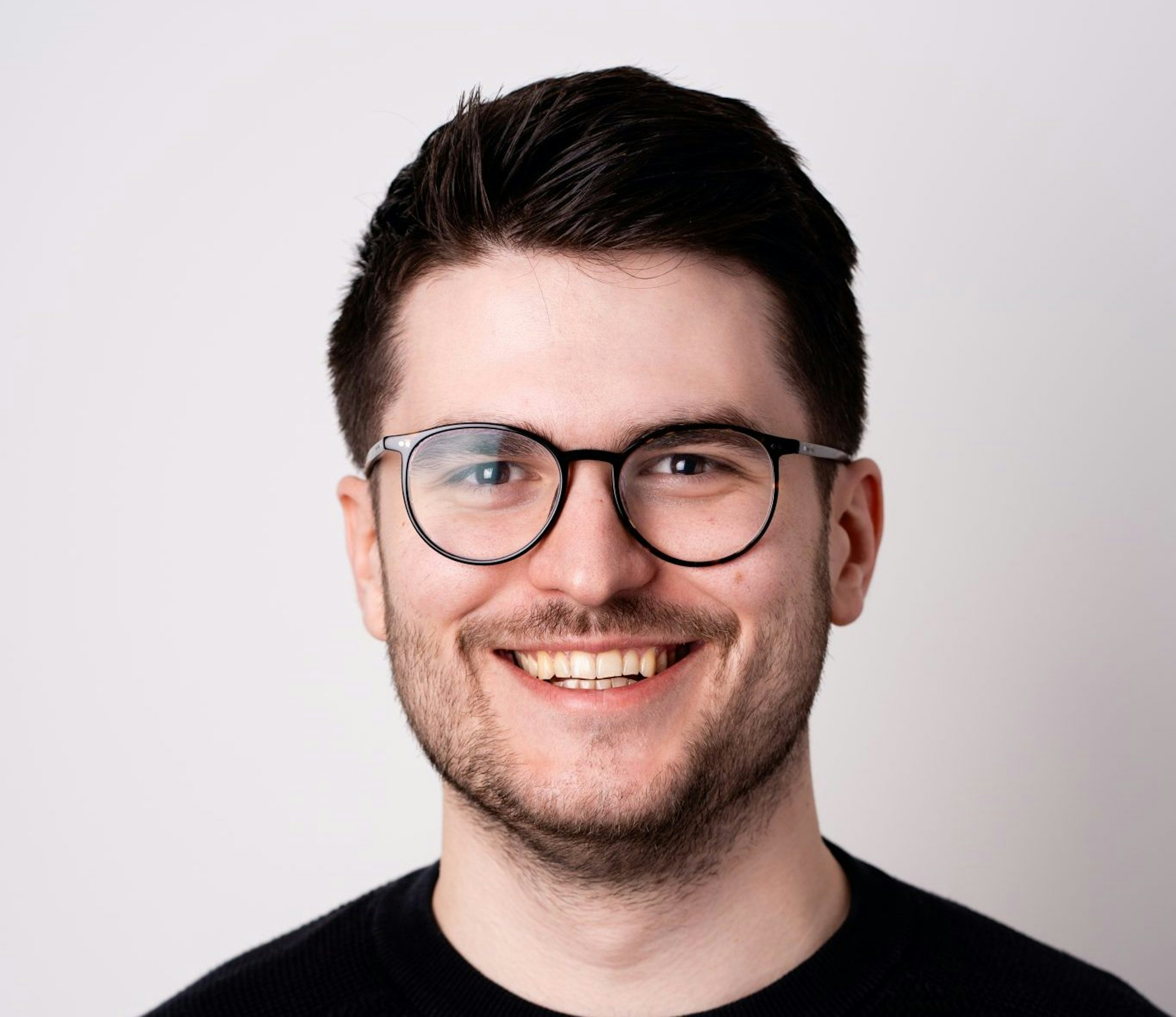 A picture of Christian Neumann, principal at First Momentum